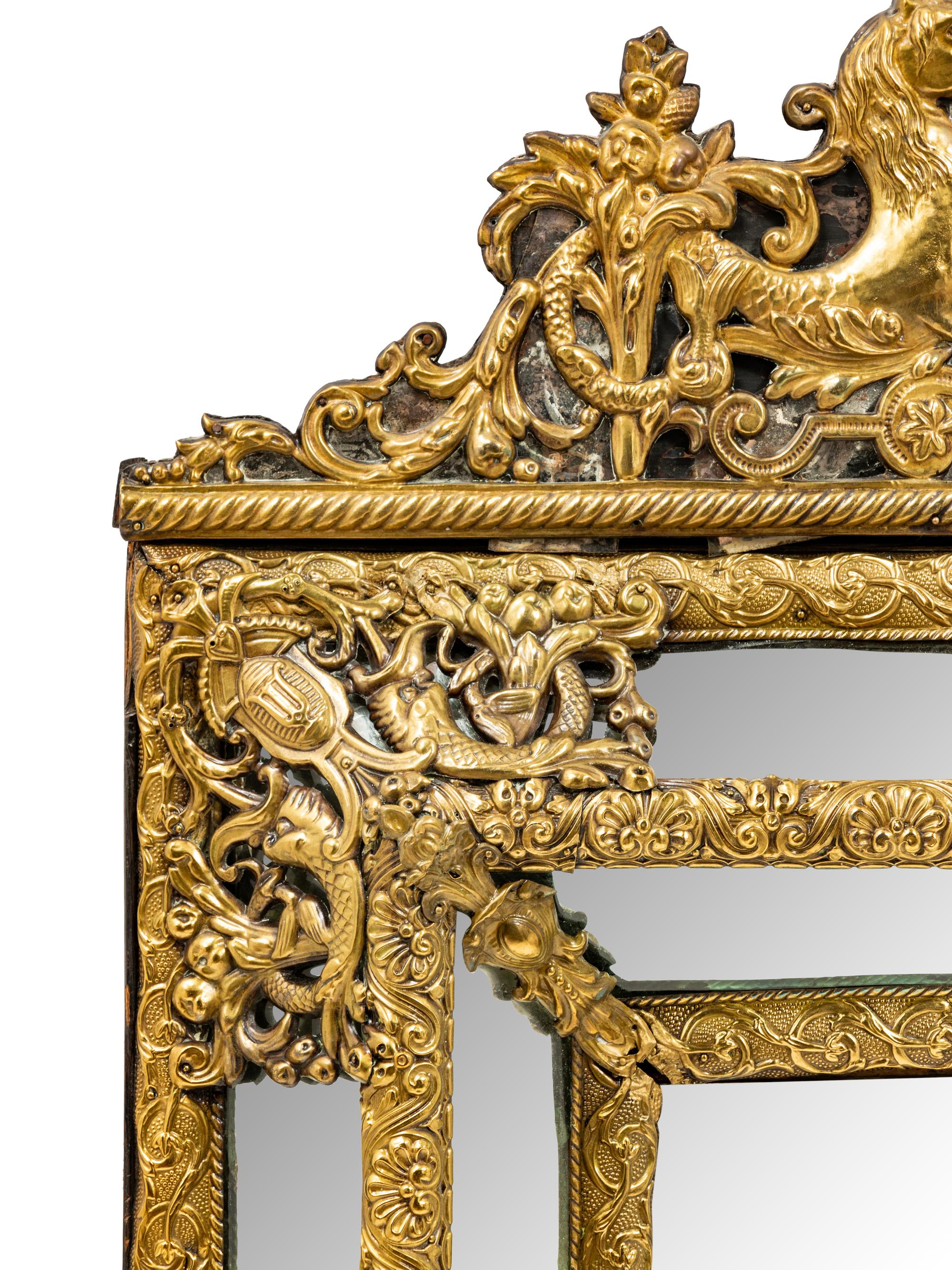 A Brass Embossed Venetian Style Mirror