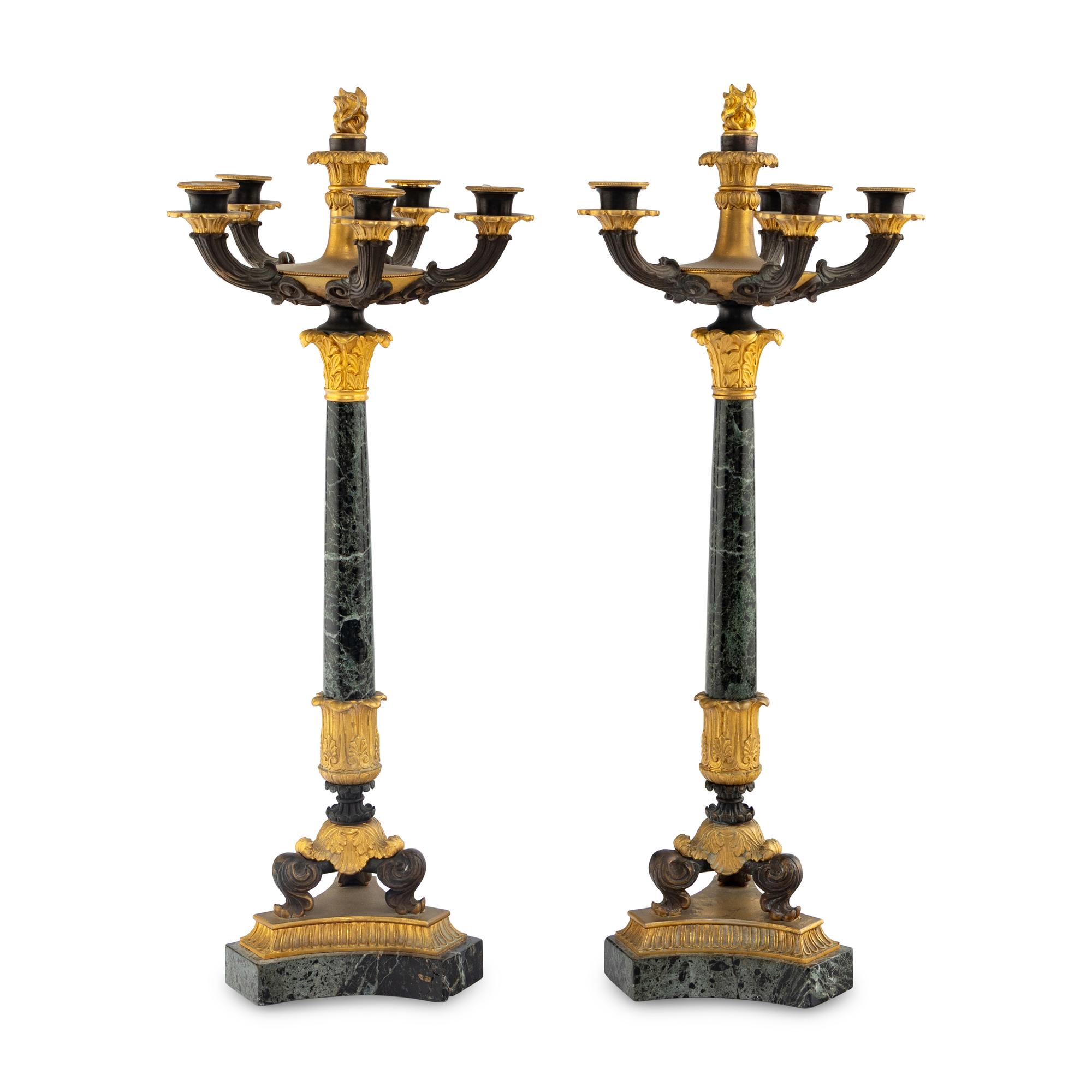 A Pair of Charles X Gilt and Patinated Bronze Mounted Marble Seven-Light Candelabra