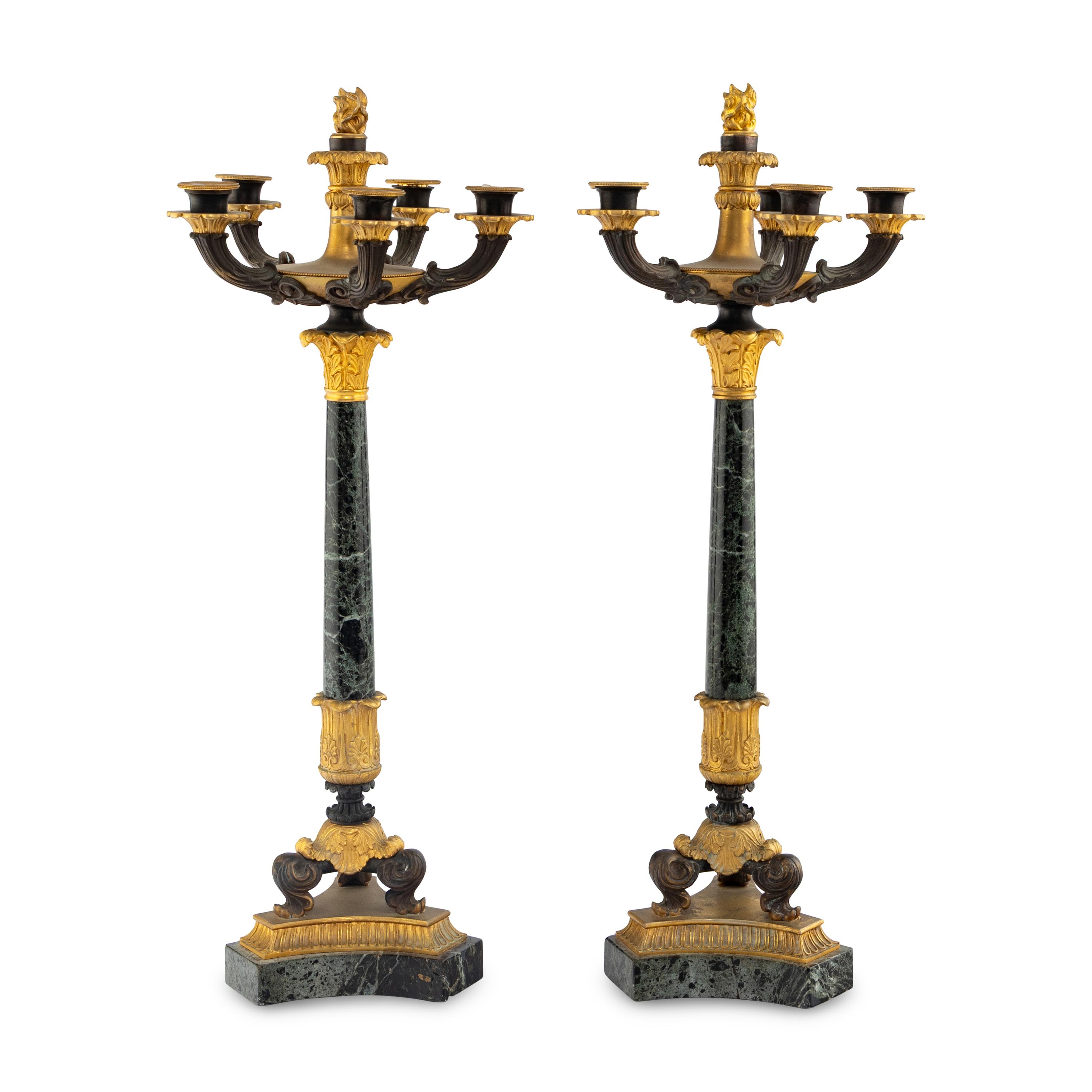 A Pair of Charles X Gilt and Patinated Bronze Mounted Marble Seven-Light Candelabra