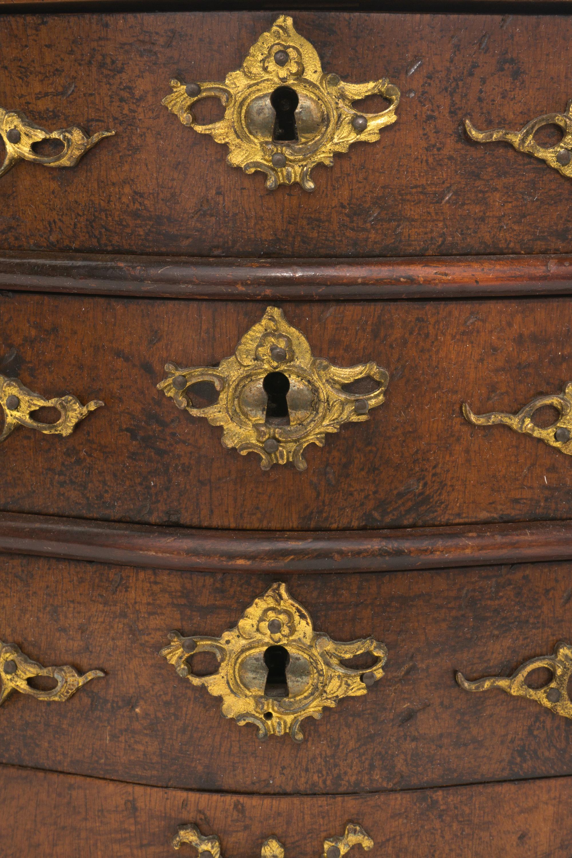 A Louis XV Style Walnut Diminutive Commode
