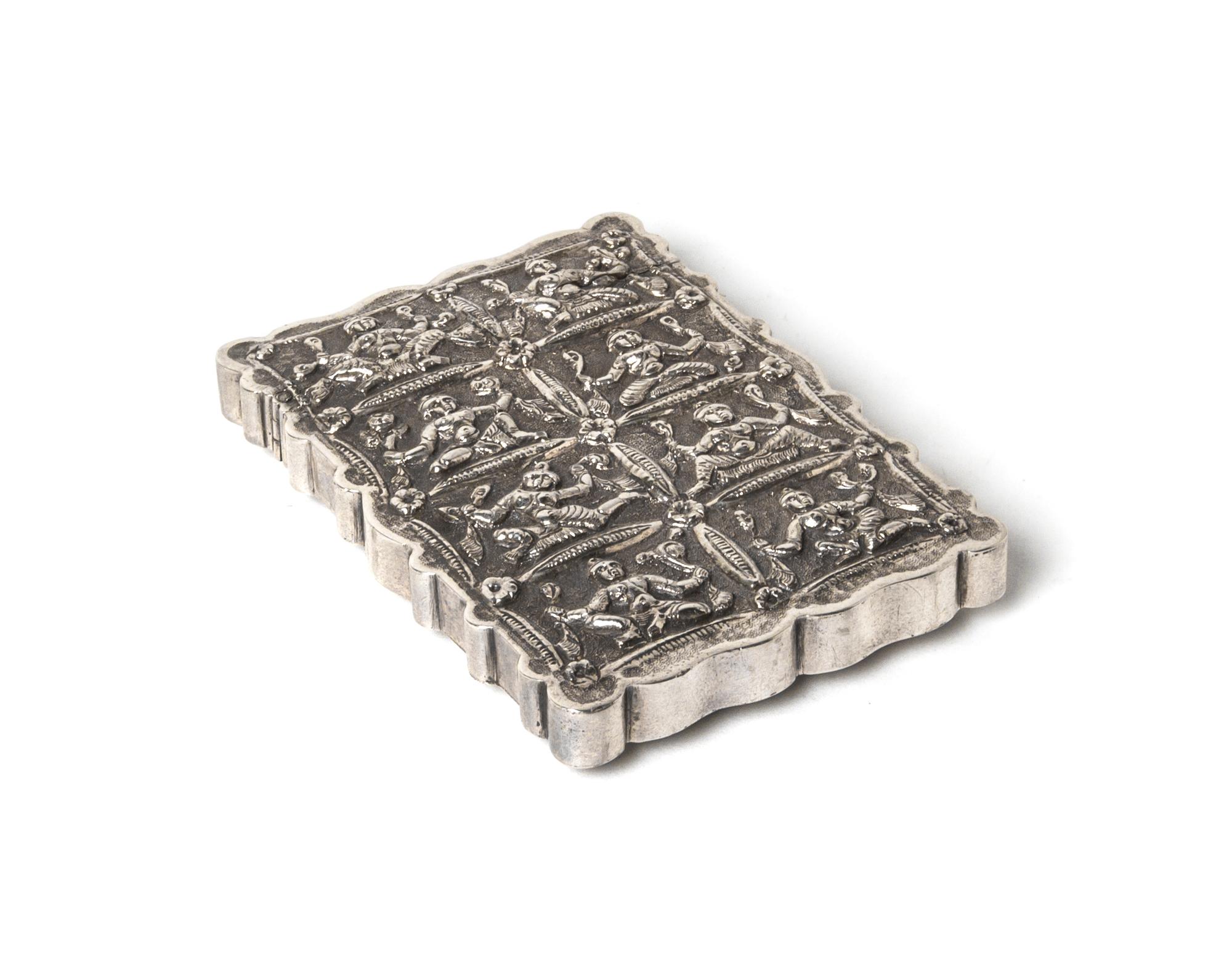 An Indian Silvered Metal Card Case, Height 3 5/8 inches.