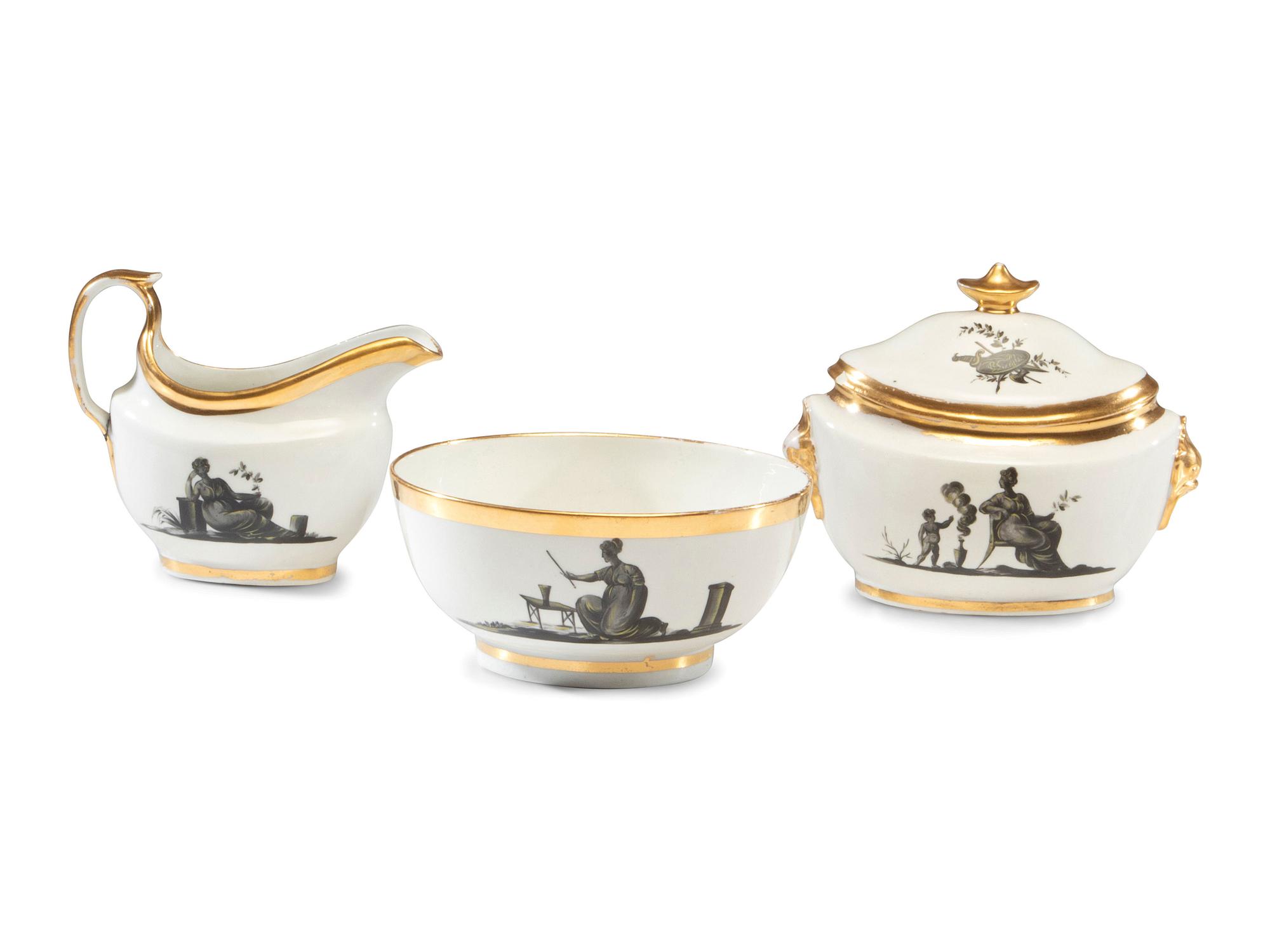 An English Porcelain Bat-Printed and Parcel Gilt Porcelain Tea Service