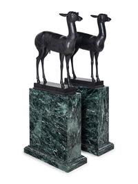 A Pair of Bronze Models of Pompeiian Deer on Marble Plinths