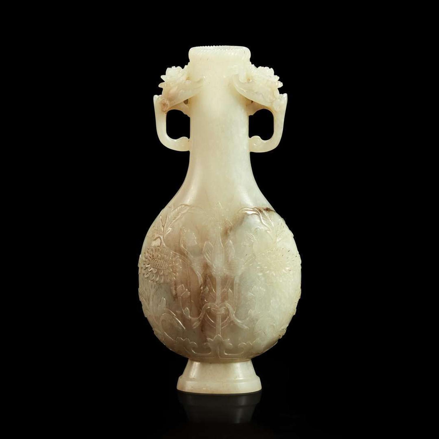 A Chinese carved white jade Mughal style small bottle vase Qing dynasty 18th/19th century