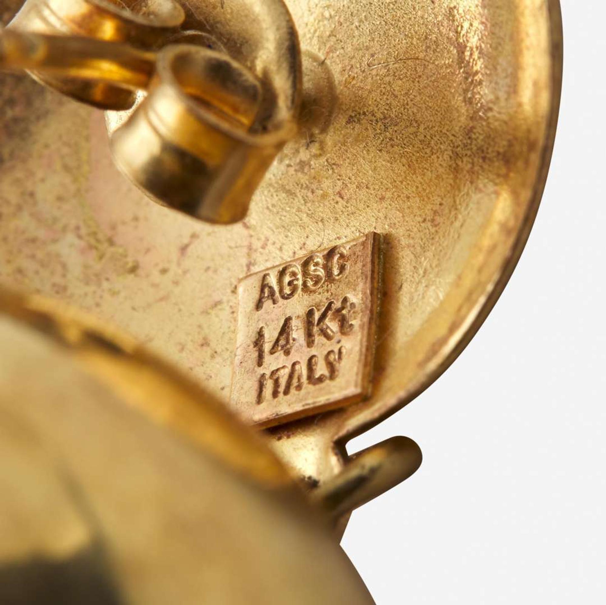 A Miscellaneous Collection of 14K Yellow Gold Earrings