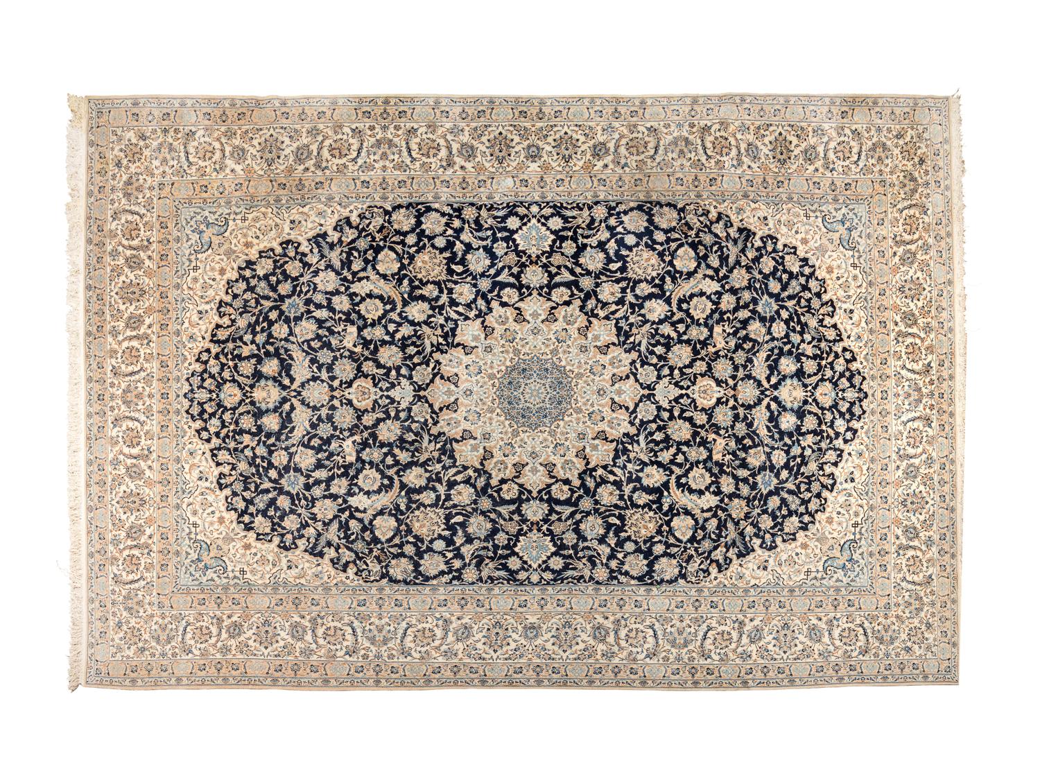 A Persian Wool and Silk Rug