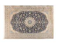A Persian Wool and Silk Rug