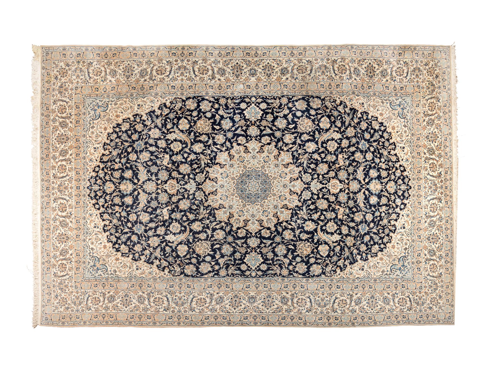 A Persian Wool and Silk Rug