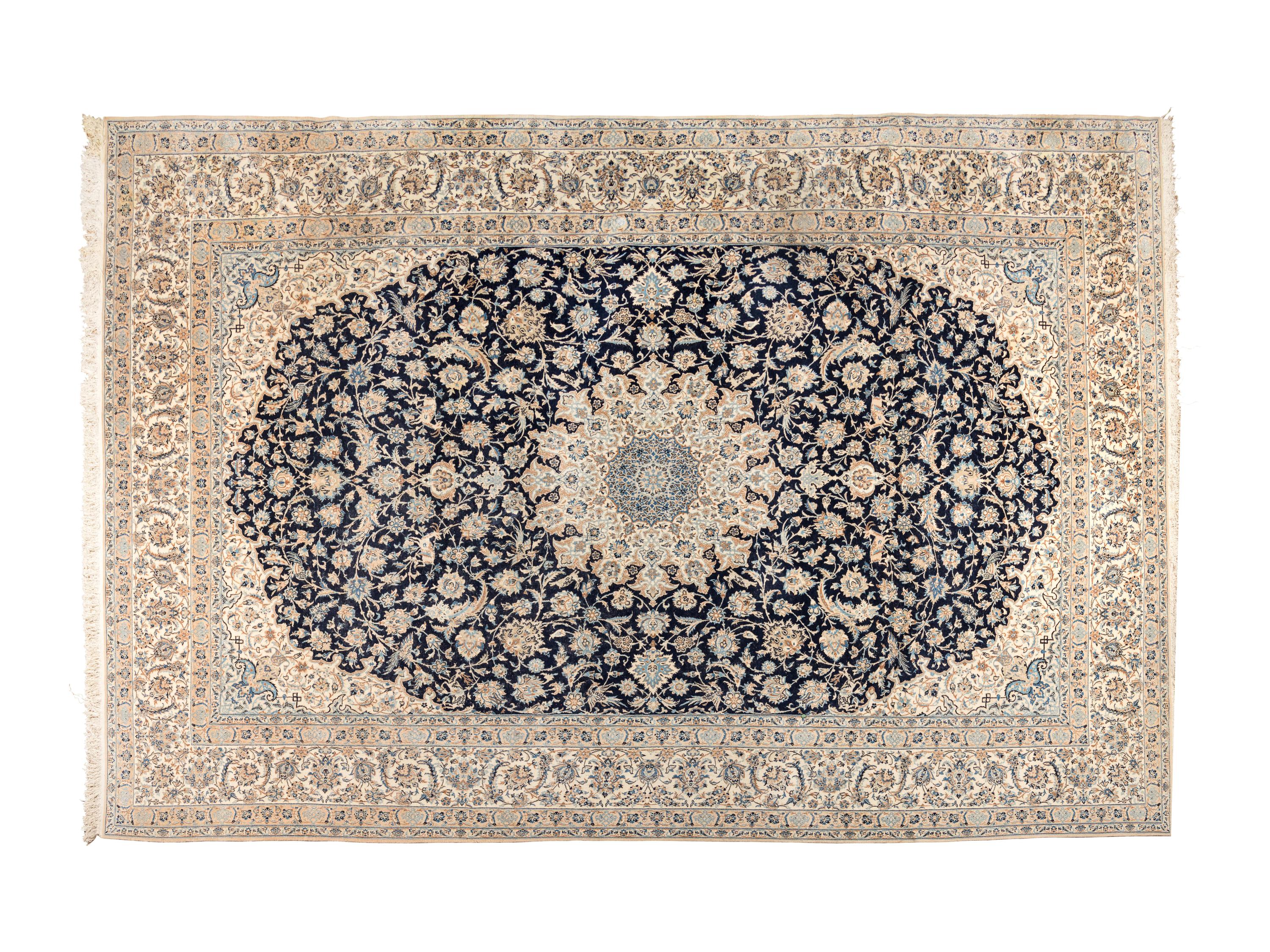 A Persian Wool and Silk Rug