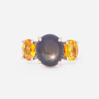 A Black Star Sapphire and Yellow Sapphire Ring