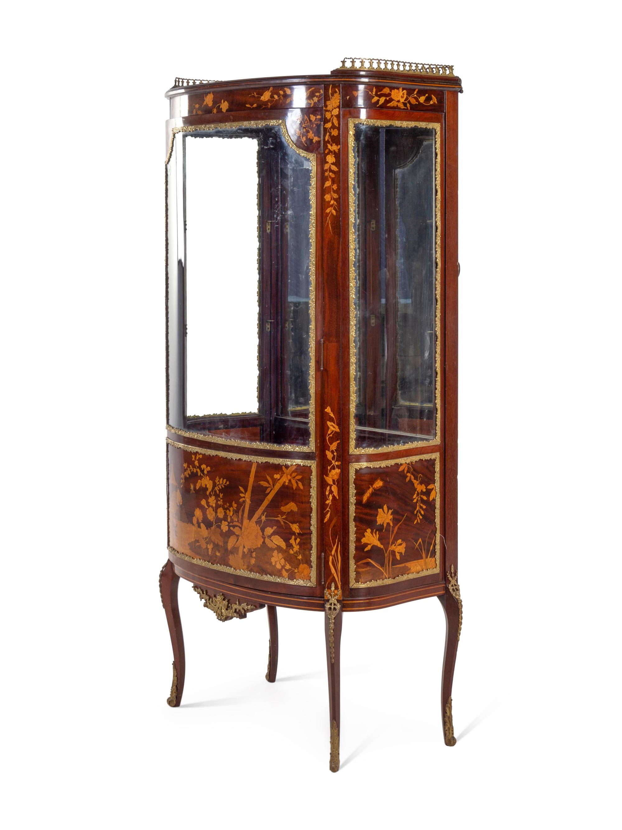 A Louis XV Style Gilt Metal Mounted Marquetry Vitrine