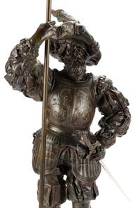 A Pair of Cast Metal Figural Torchères