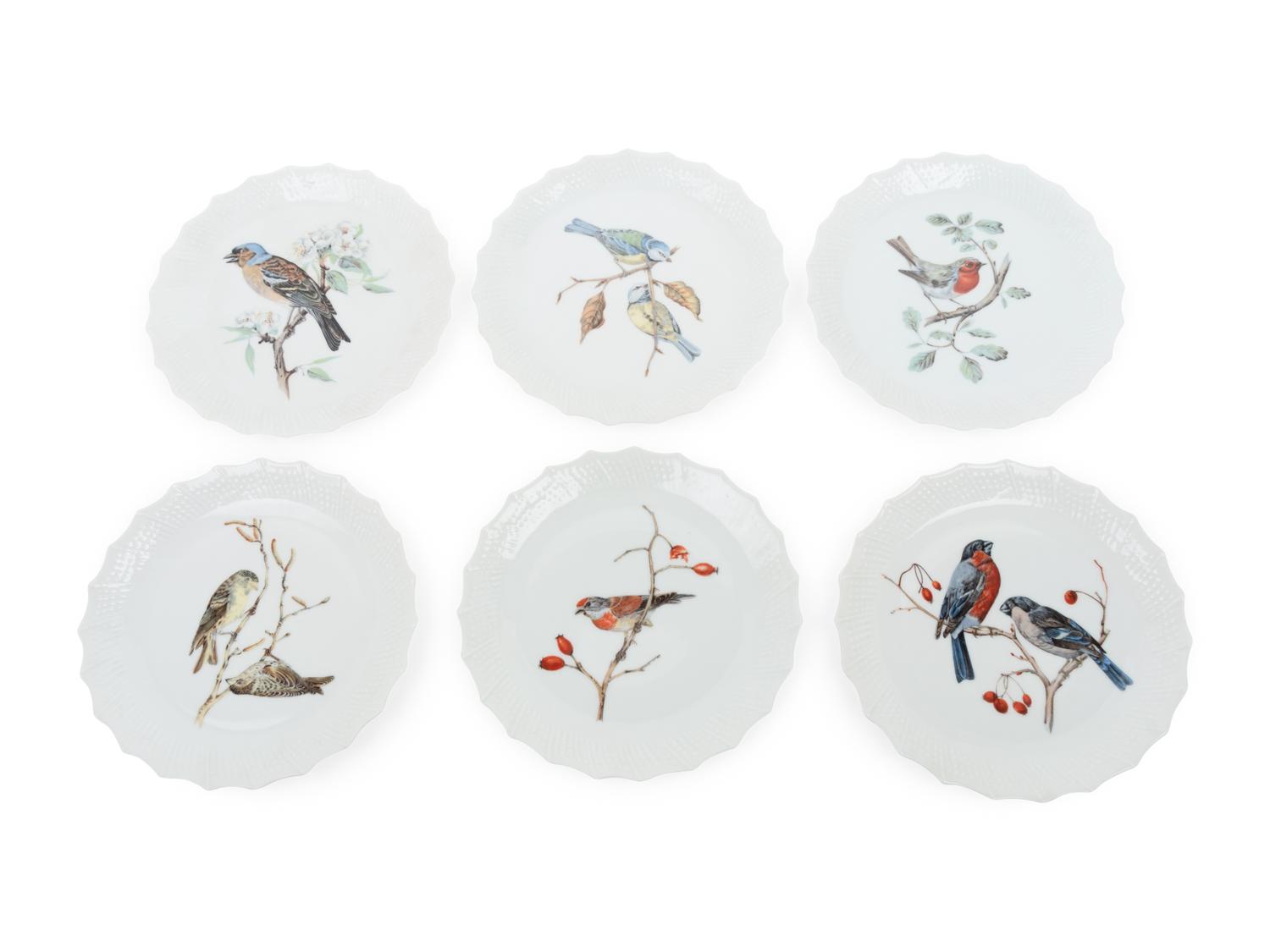 A Set of Six Limoges Porcelain Dessert Plates