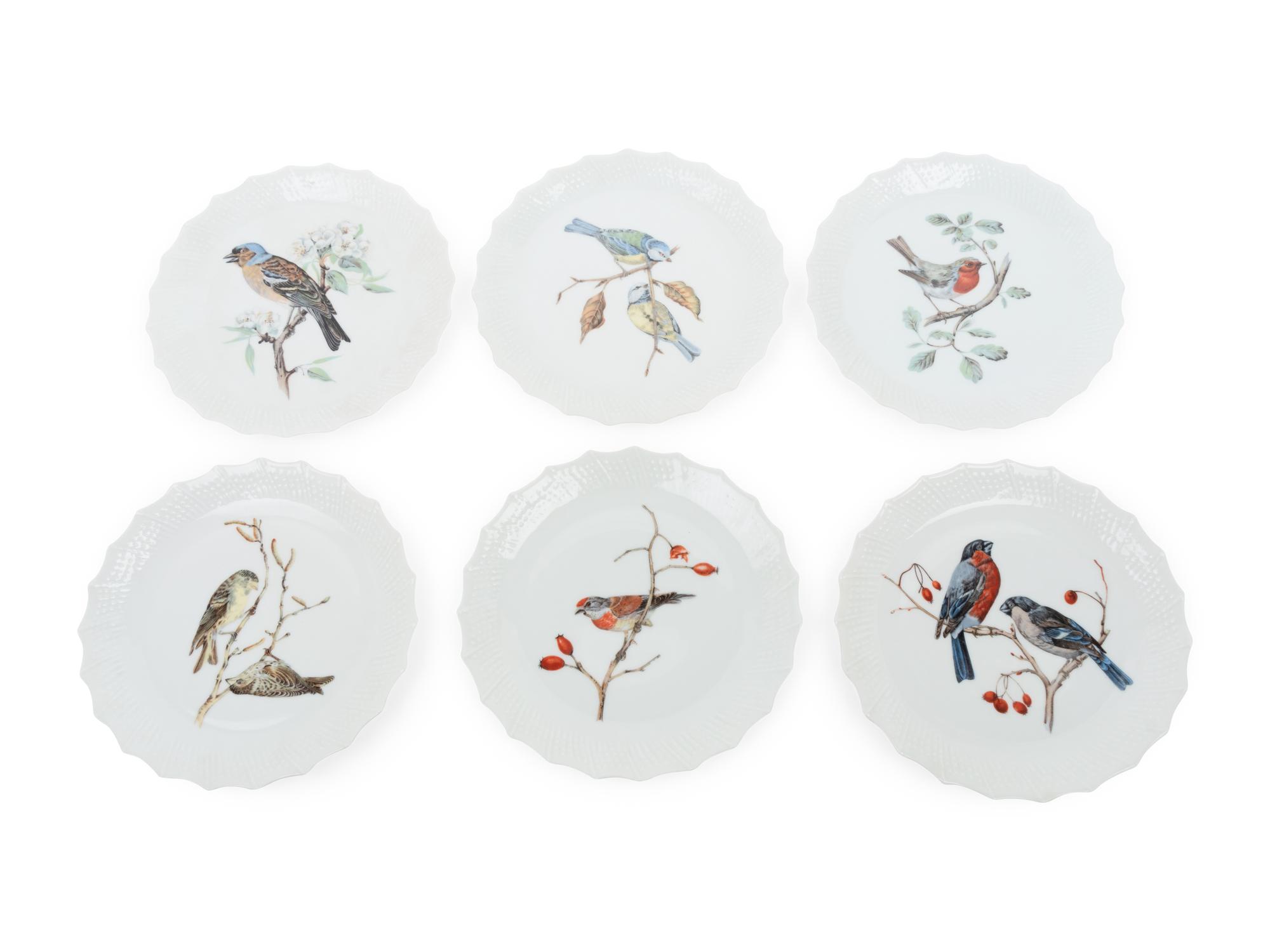 A Set of Six Limoges Porcelain Dessert Plates