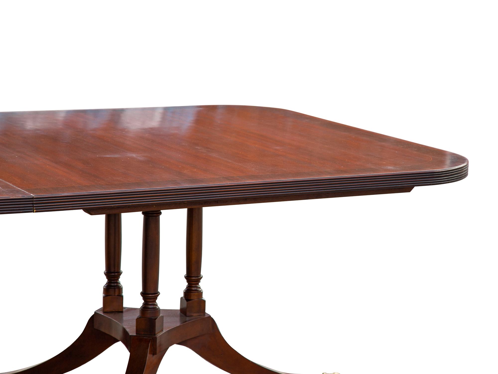 A Regency Style Walnut Dining Table