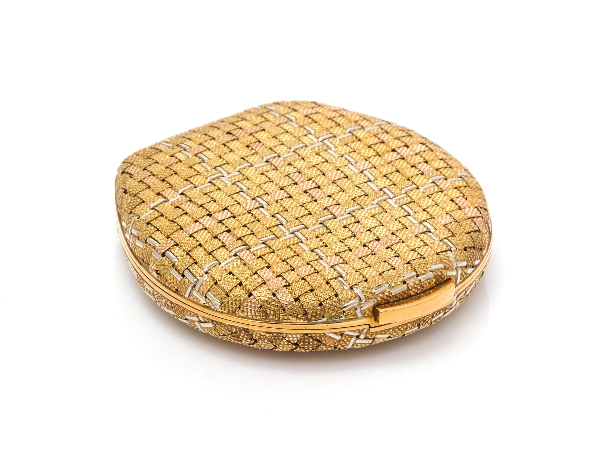 A 14 Karat Tri-Color Gold Compact, 41.90 dwts. (gross weight including mirror)