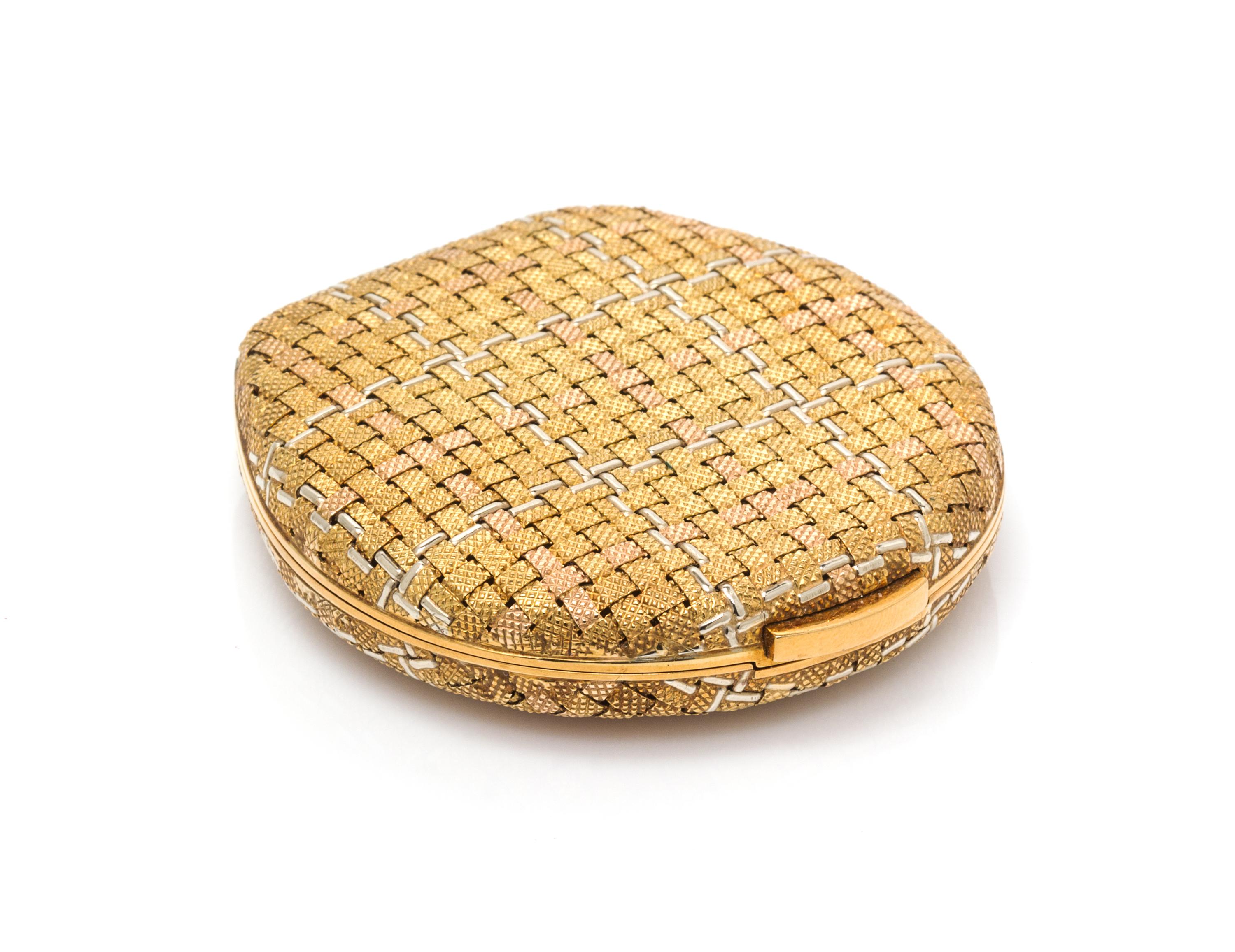 A 14 Karat Tri-Color Gold Compact, 41.90 dwts. (gross weight including mirror)