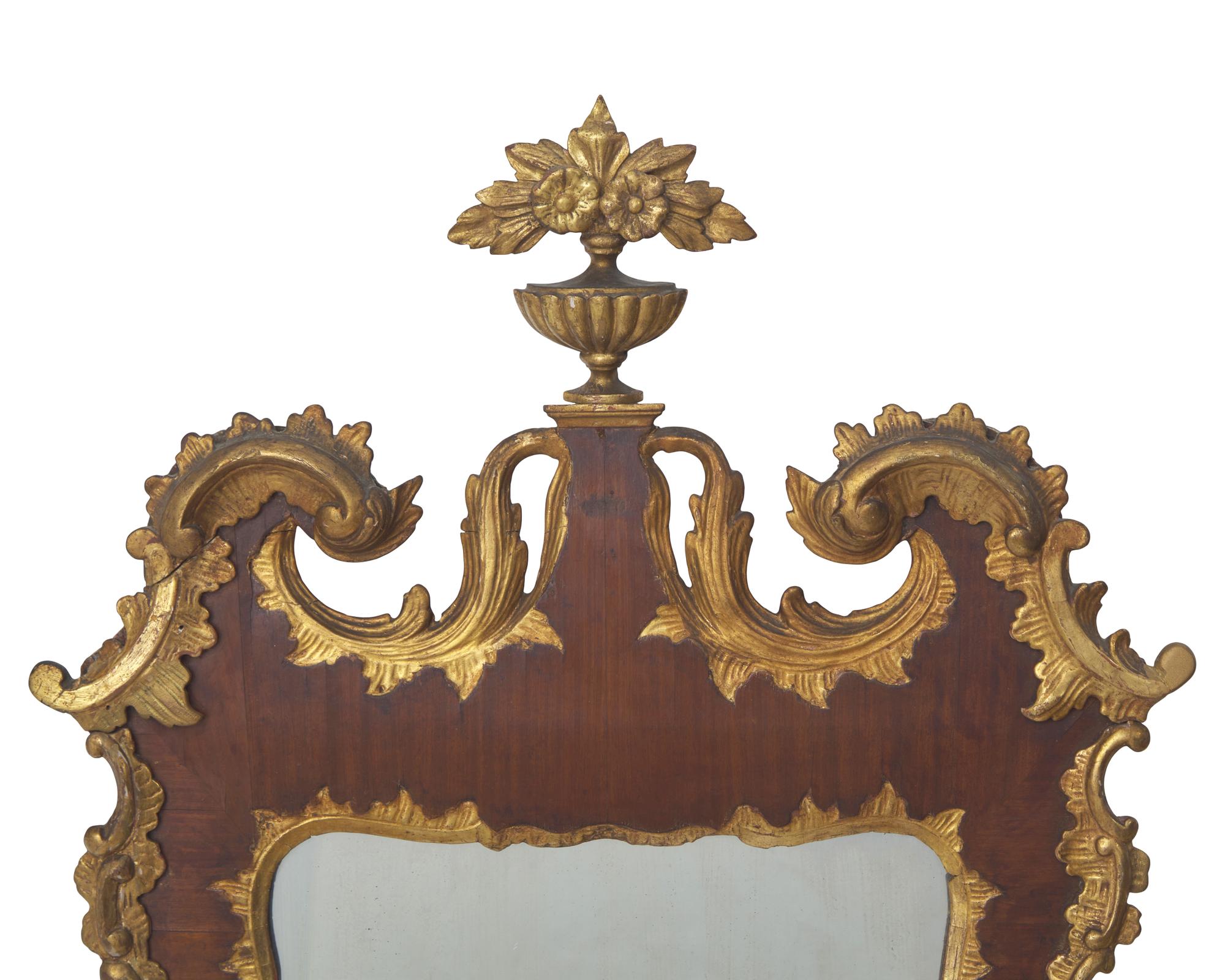 A Chippendale Parcel-Gilt And Mahogany-Veneered Looking Glass