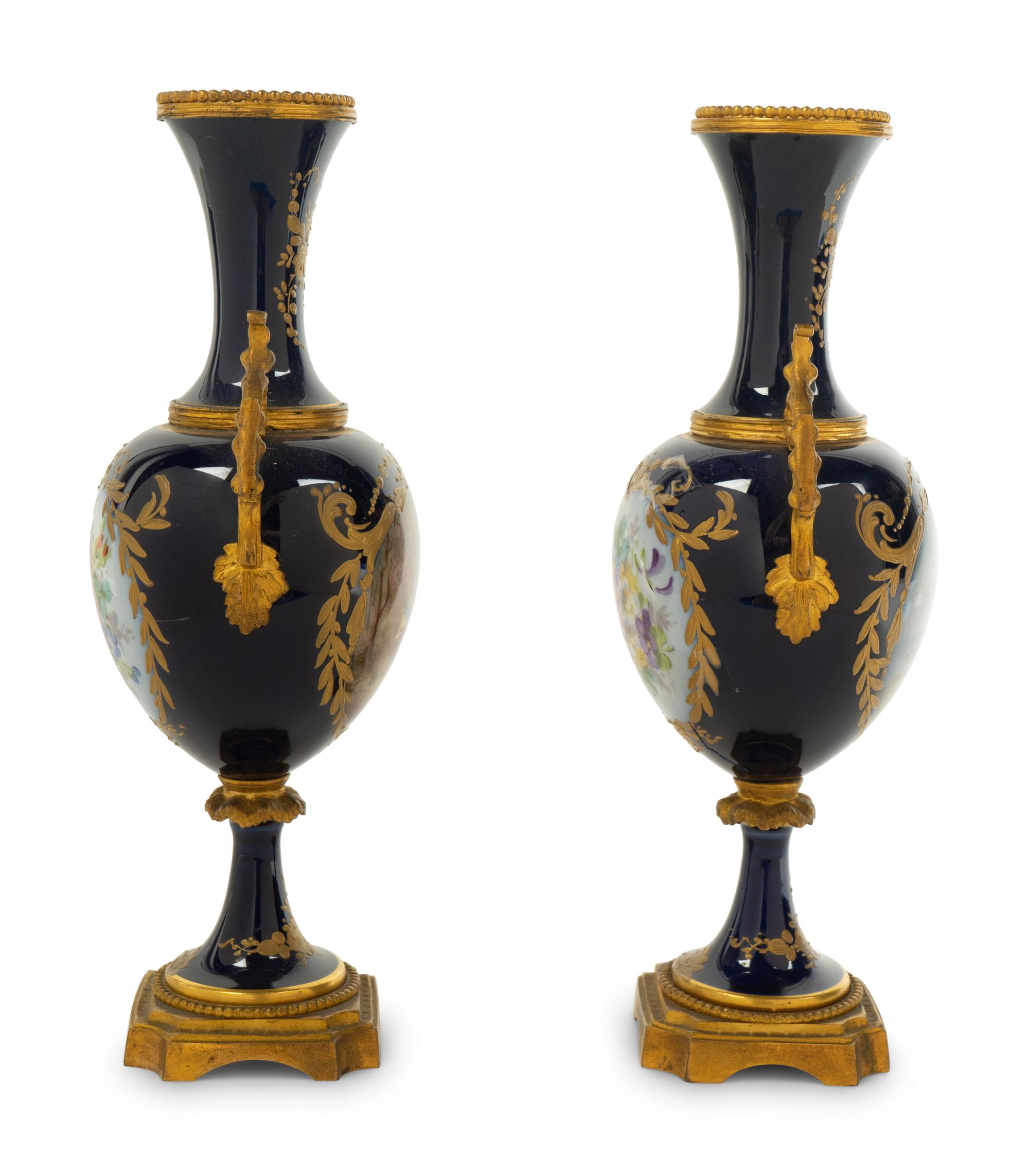 A Pair of Sèvres Style Gilt Bronze Mounted Porcelain Baluster Vases — 19TH CENTURY