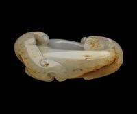 A Chinese Russet and White Jade 'Chilong' Bi- Form Pendant