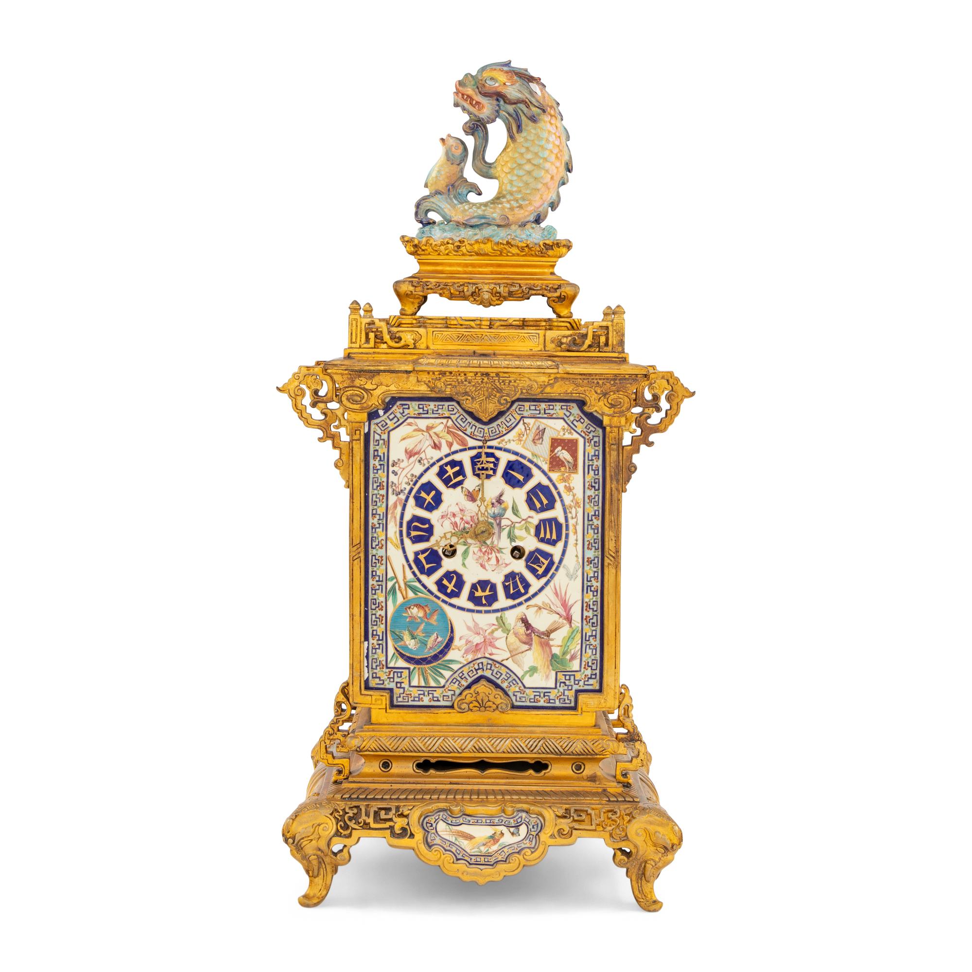 A French "Japonisme" Gilt Bronze and Porcelain Mounted Clock