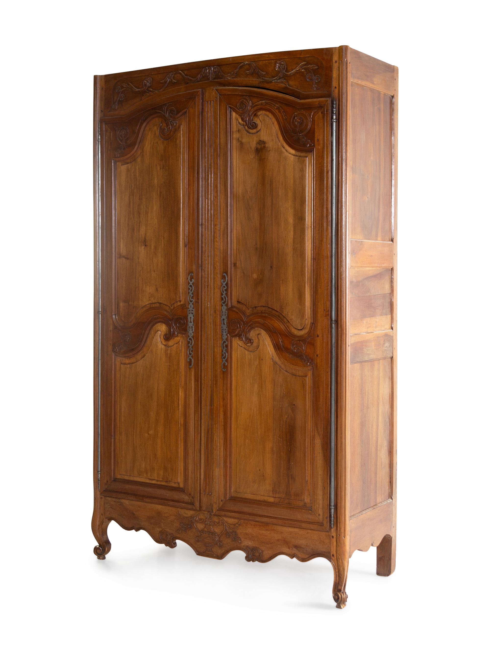 A French Provincial Walnut Armoire