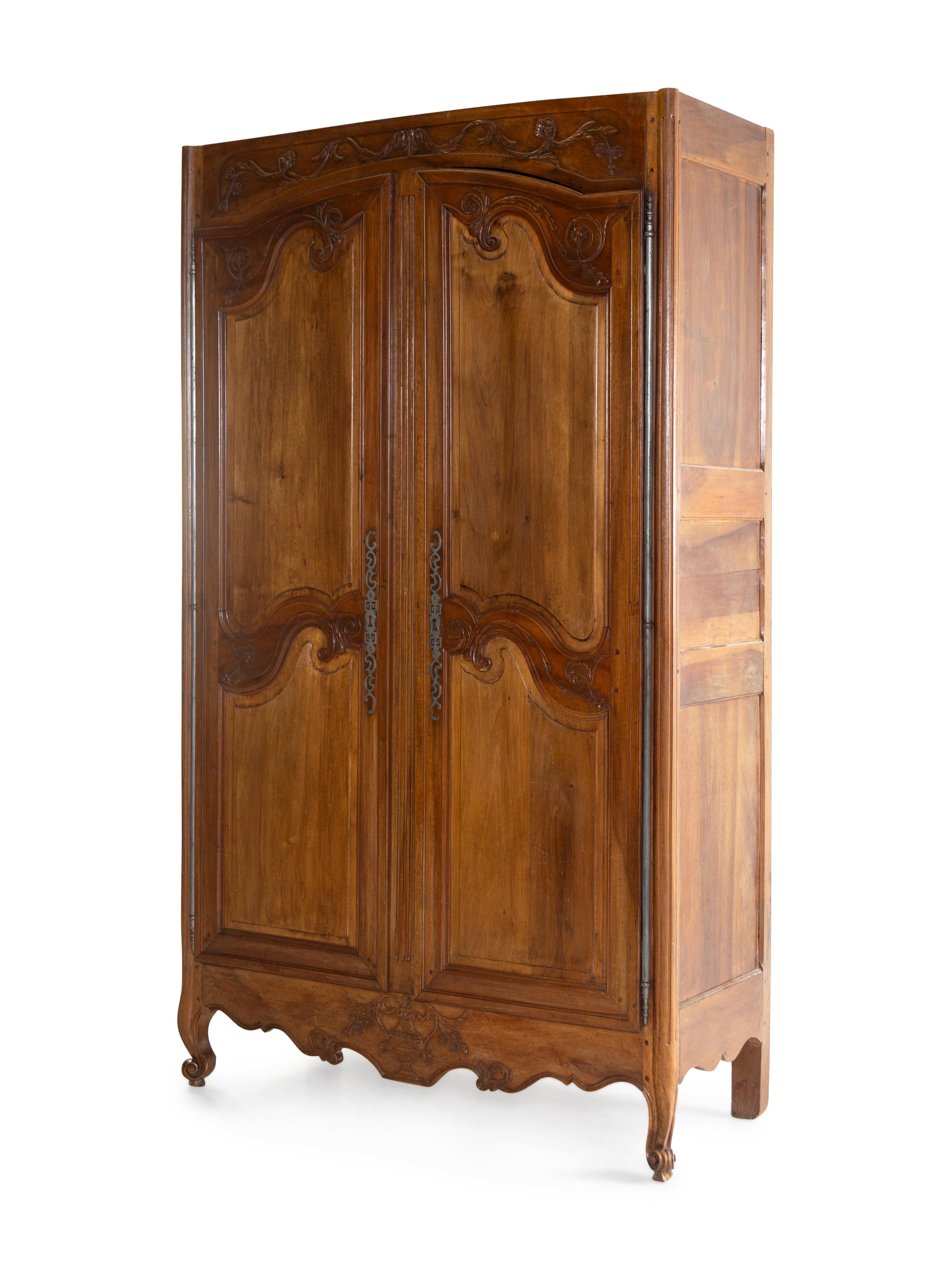 A French Provincial Walnut Armoire