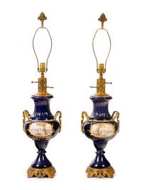 A Pair of Sèvres Style Porcelain Vases Mounted as Lamps
