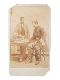 [CIVIL WAR]. CDV of a Union line officer with African American assistant. Ca 1860s.