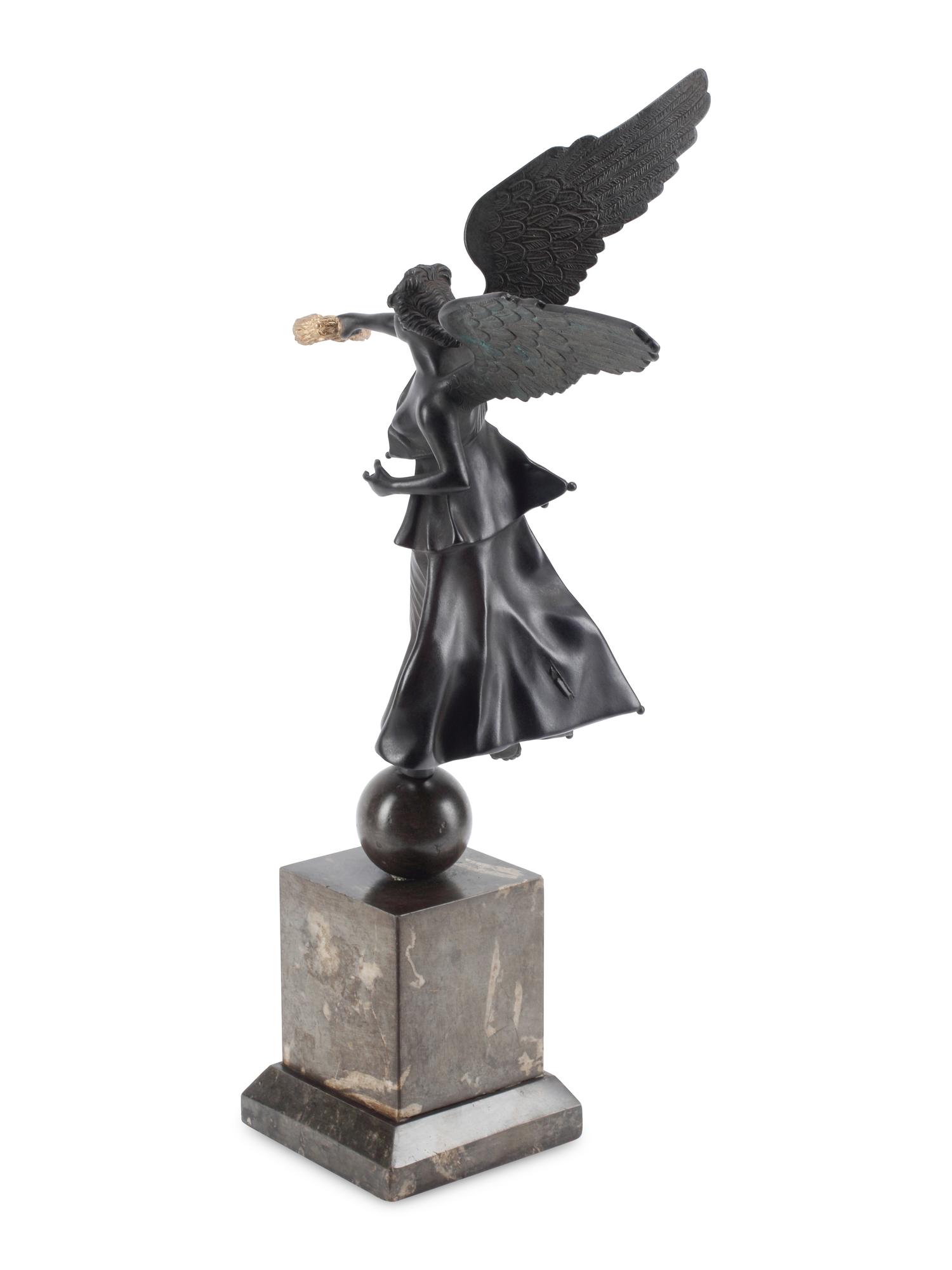 A Patinated and Parcel Gilt Bronze Figure of Winged Liberty