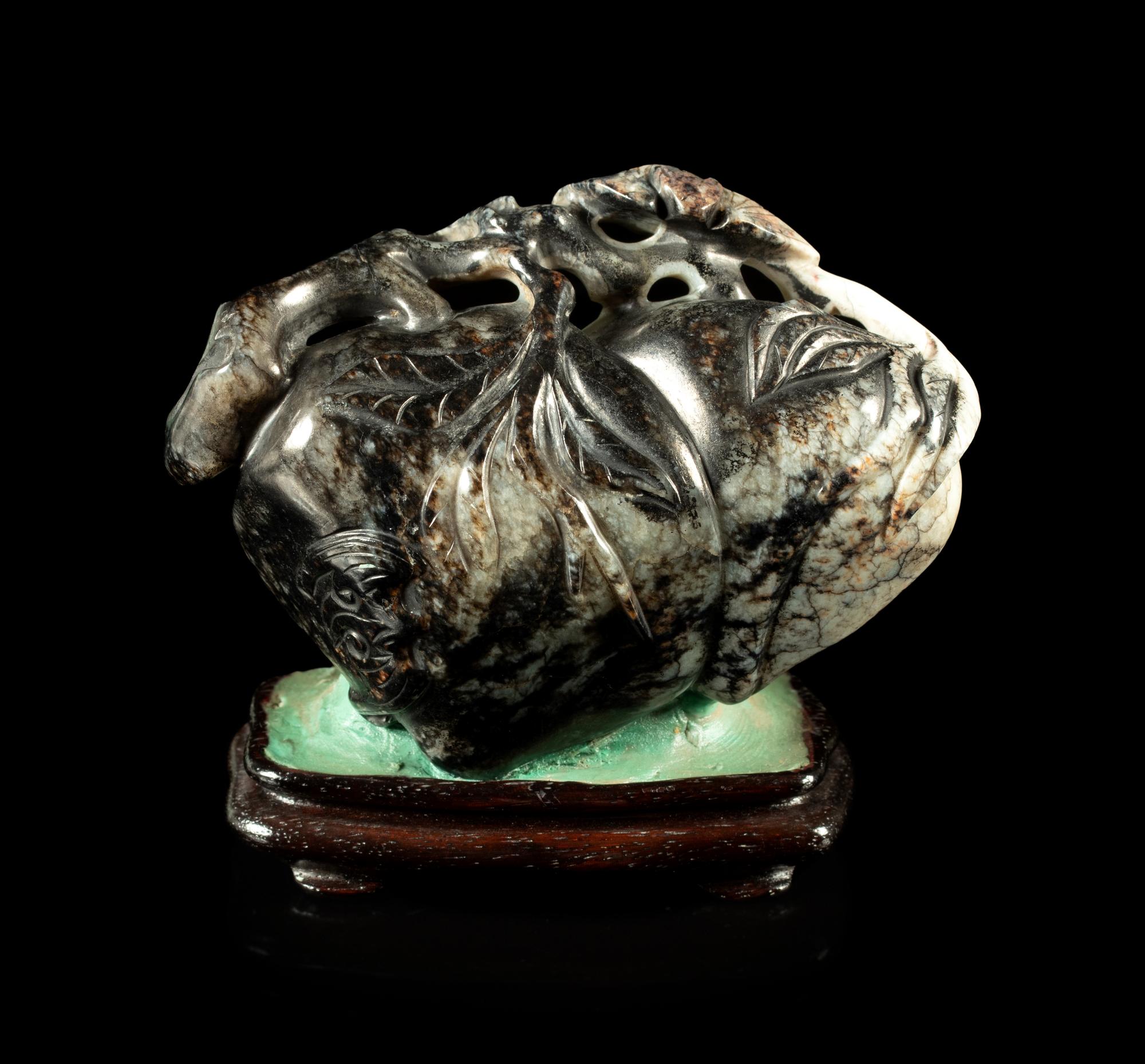A Black and Grey Jade 'Bat and Peaches' Carving