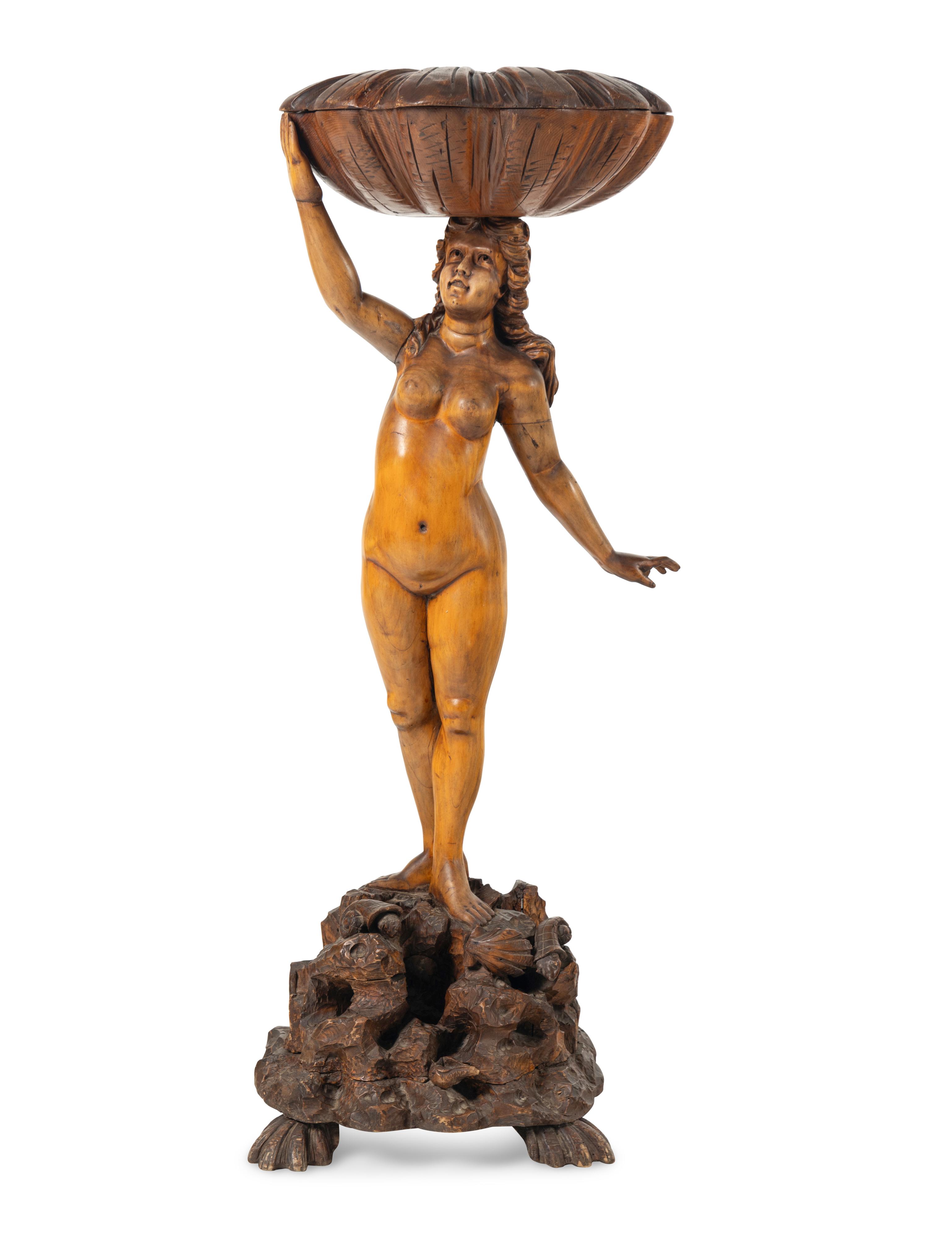 A Venetian Carved Walnut Figural Dressing Stand
