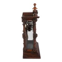 A Carved Rosewood Welch 'Patti VP' Shelf Clock