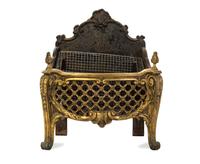 A Louis XV Style Gilt Bronze Fire Grate, EARLY 20TH CENTURY, Height 22 1/4 x width 18 1/2 x depth 11 1/2 inches. — EARLY 20TH CENTURY,