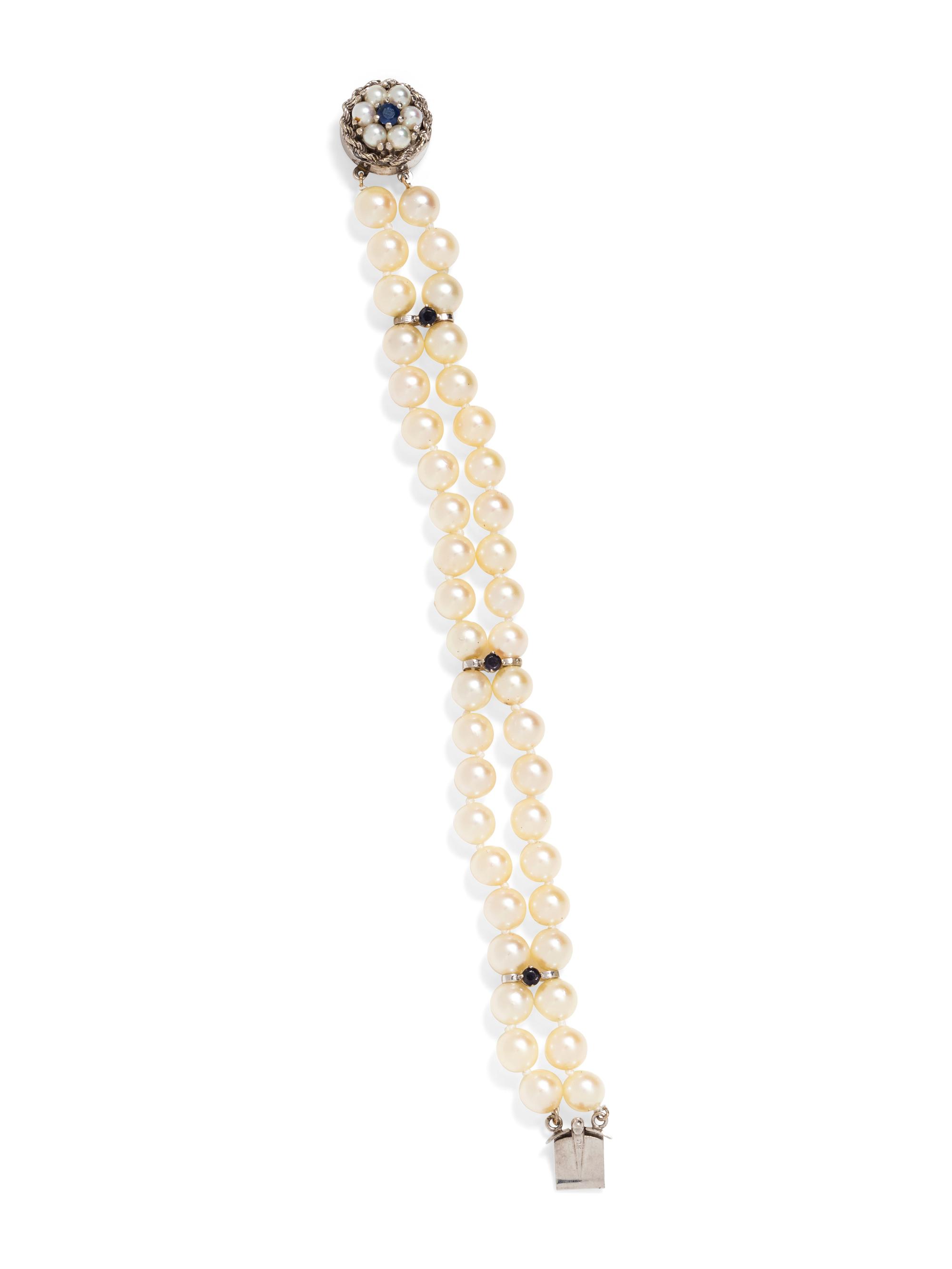 A 14 Karat White Gold, Cultured Pearl and Sapphire Bracelet,