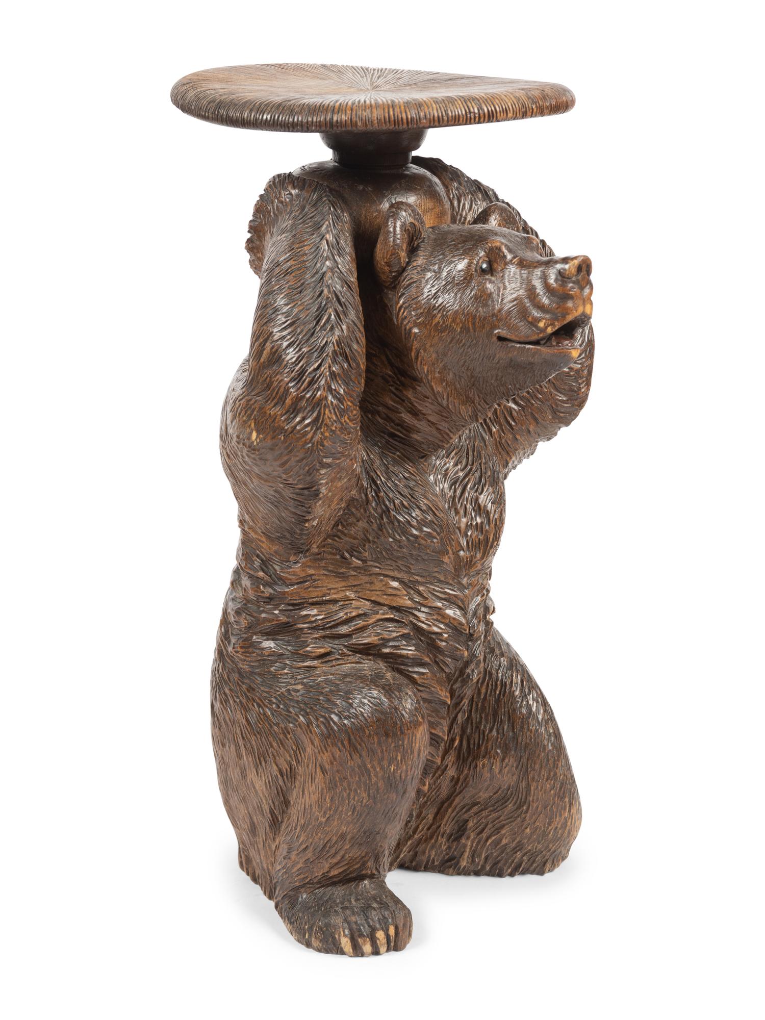 A Black Forest Carved Figural Stool