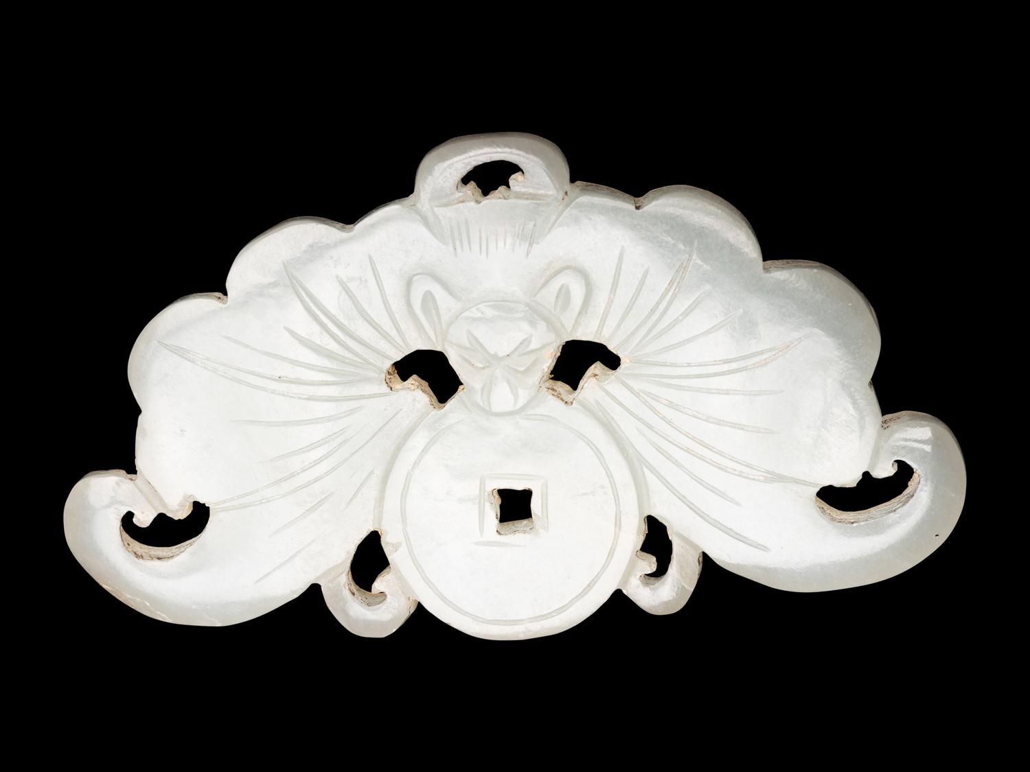 Three Chinese Pale Celadon Jade Reticulated Flori-Form Pendants