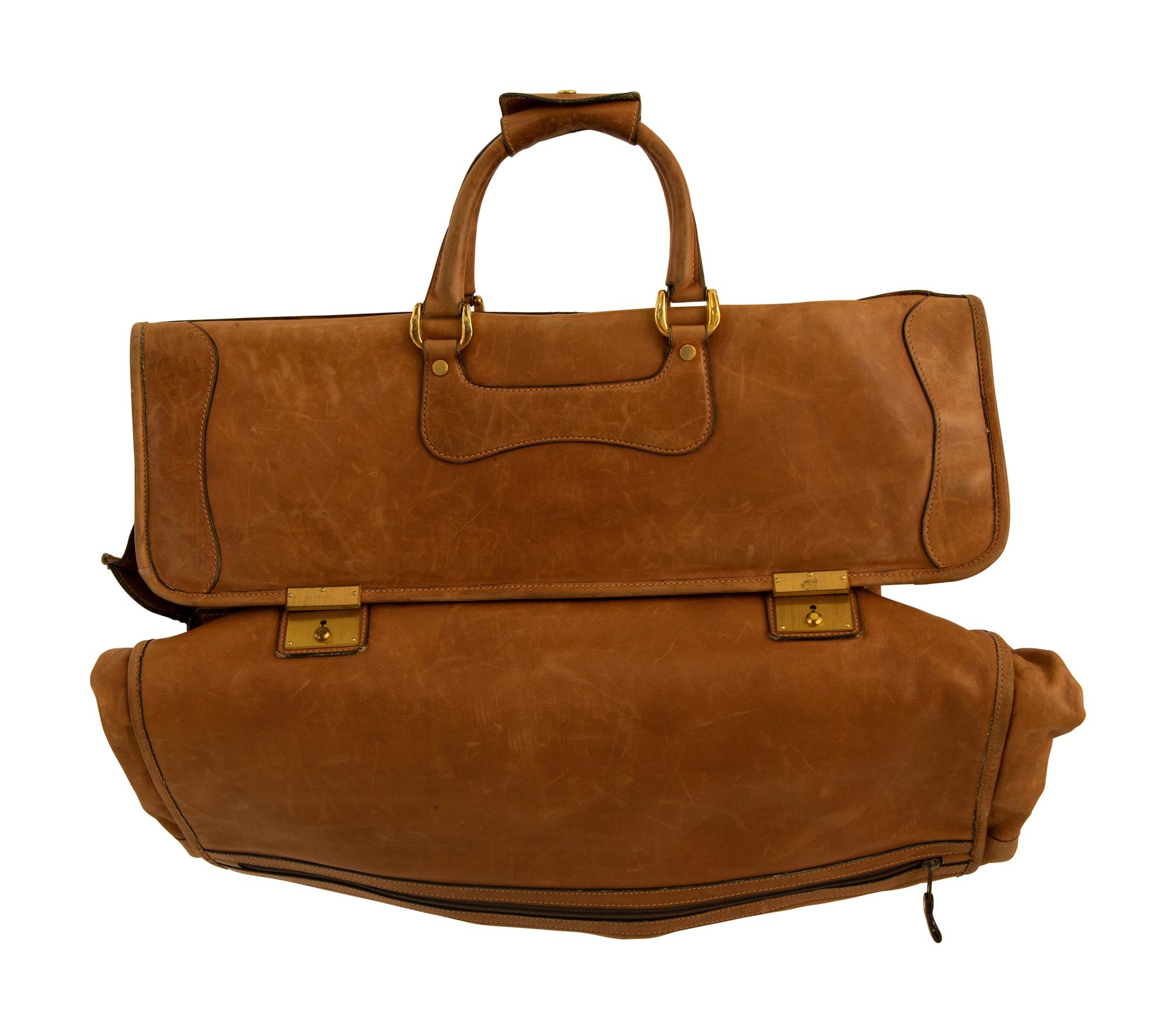 Two Bottega Veneta Suitcases and a Gucci Leather Garment Bag
