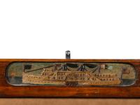 A Folk Art Carved and Painted Wood Frame