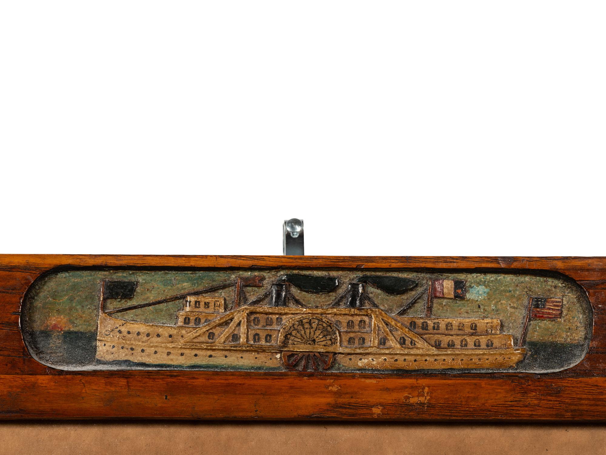 A Folk Art Carved and Painted Wood Frame