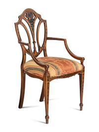 An Edwardian Painted Satinwood Triple-Back Settee and Armchair