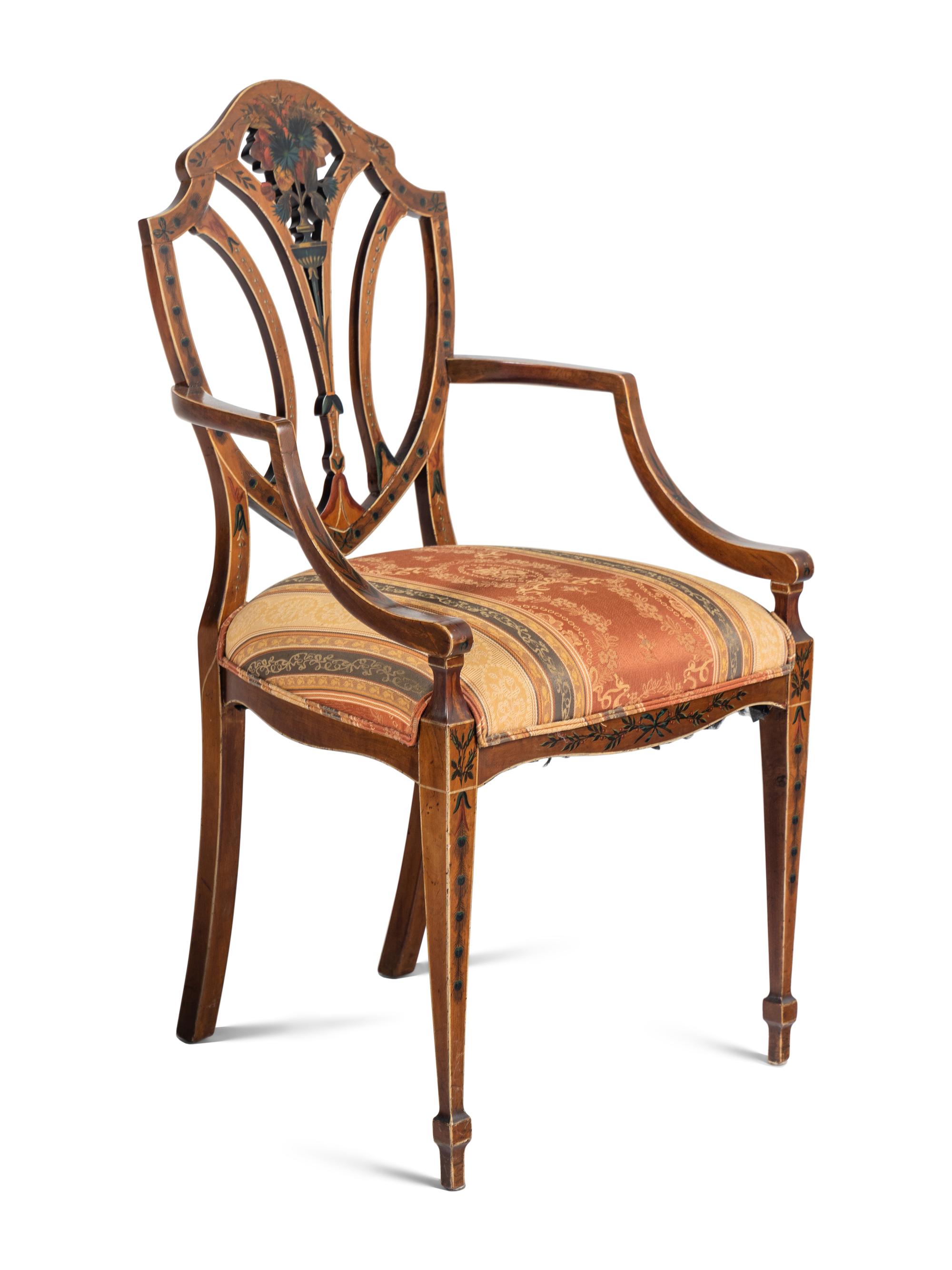 An Edwardian Painted Satinwood Triple-Back Settee and Armchair