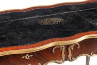 A Louis XV Style Gilt Bronze Mounted Kingwood Bureau Plat
