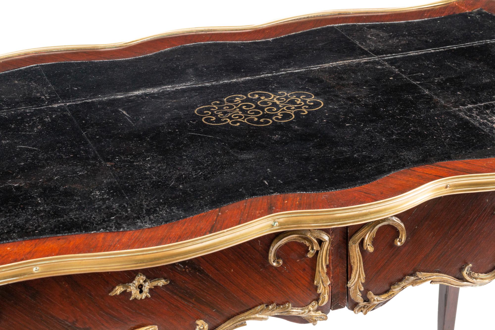 A Louis XV Style Gilt Bronze Mounted Kingwood Bureau Plat