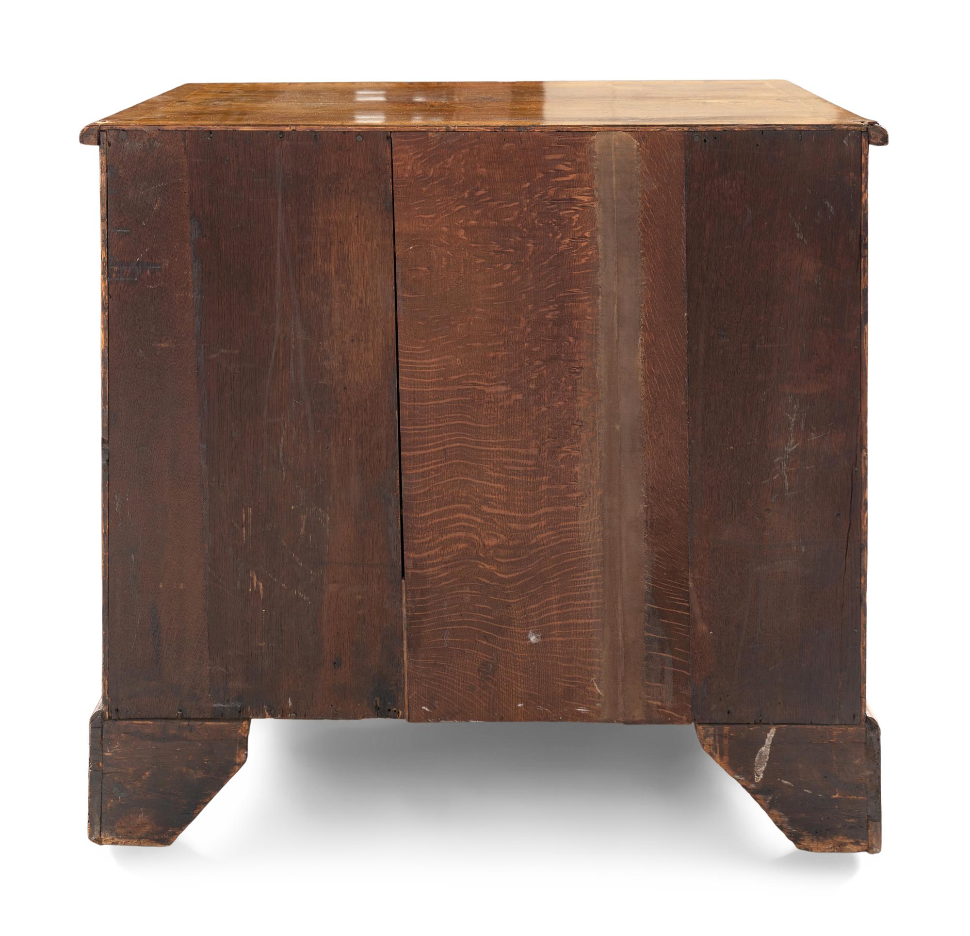 A George II Walnut Kneehole Desk