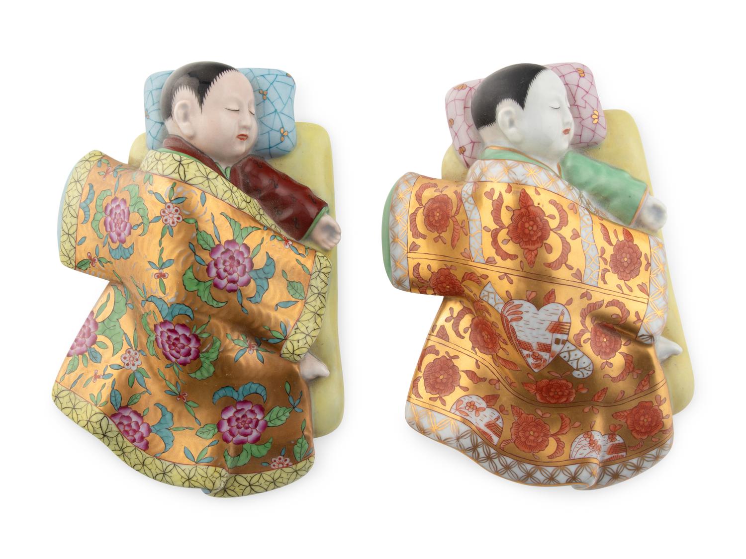 A Pair of Herend Porcelain Sleeping-Child Figures