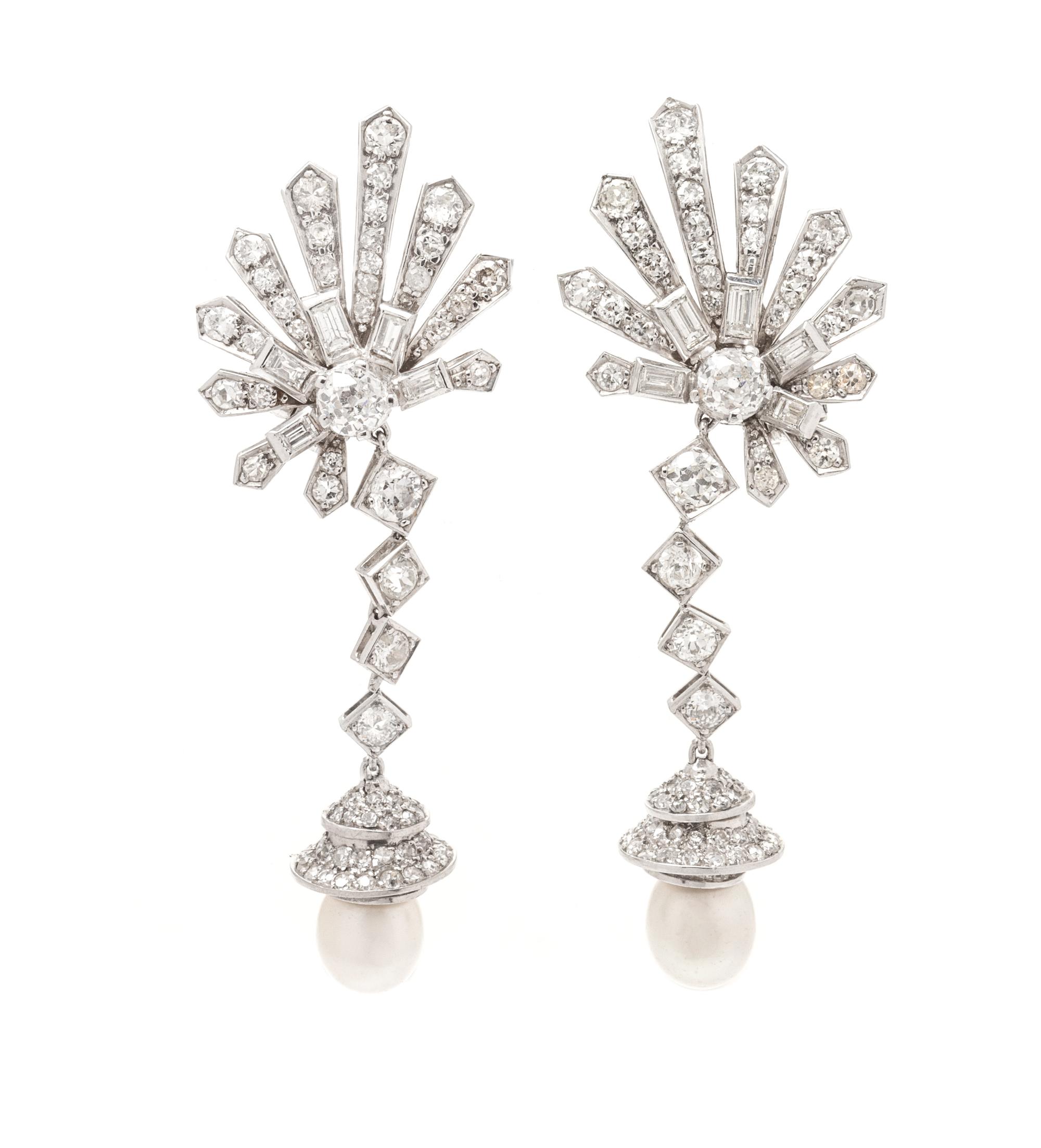 A Pair of Platinum, Natural Pearl and Diamond Pendant Earclips, 17.30 dwts.