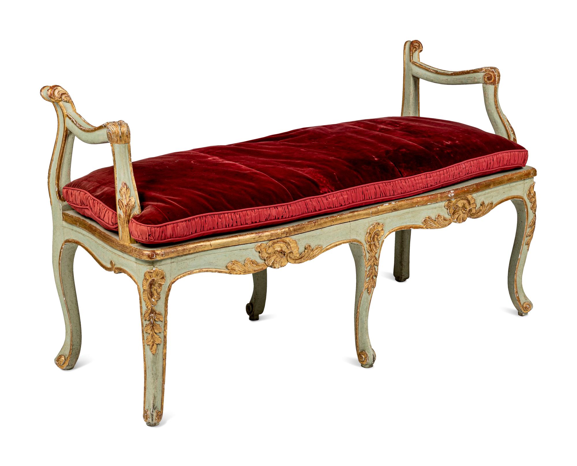 A Pair of Louis XV Green-Painted and Parcel-Gilt Cane Seat Window Benches