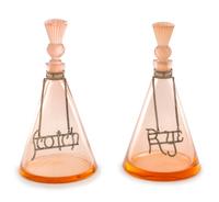 A Pair of Silvered Metal Mounted Glass Liqueur Bottles