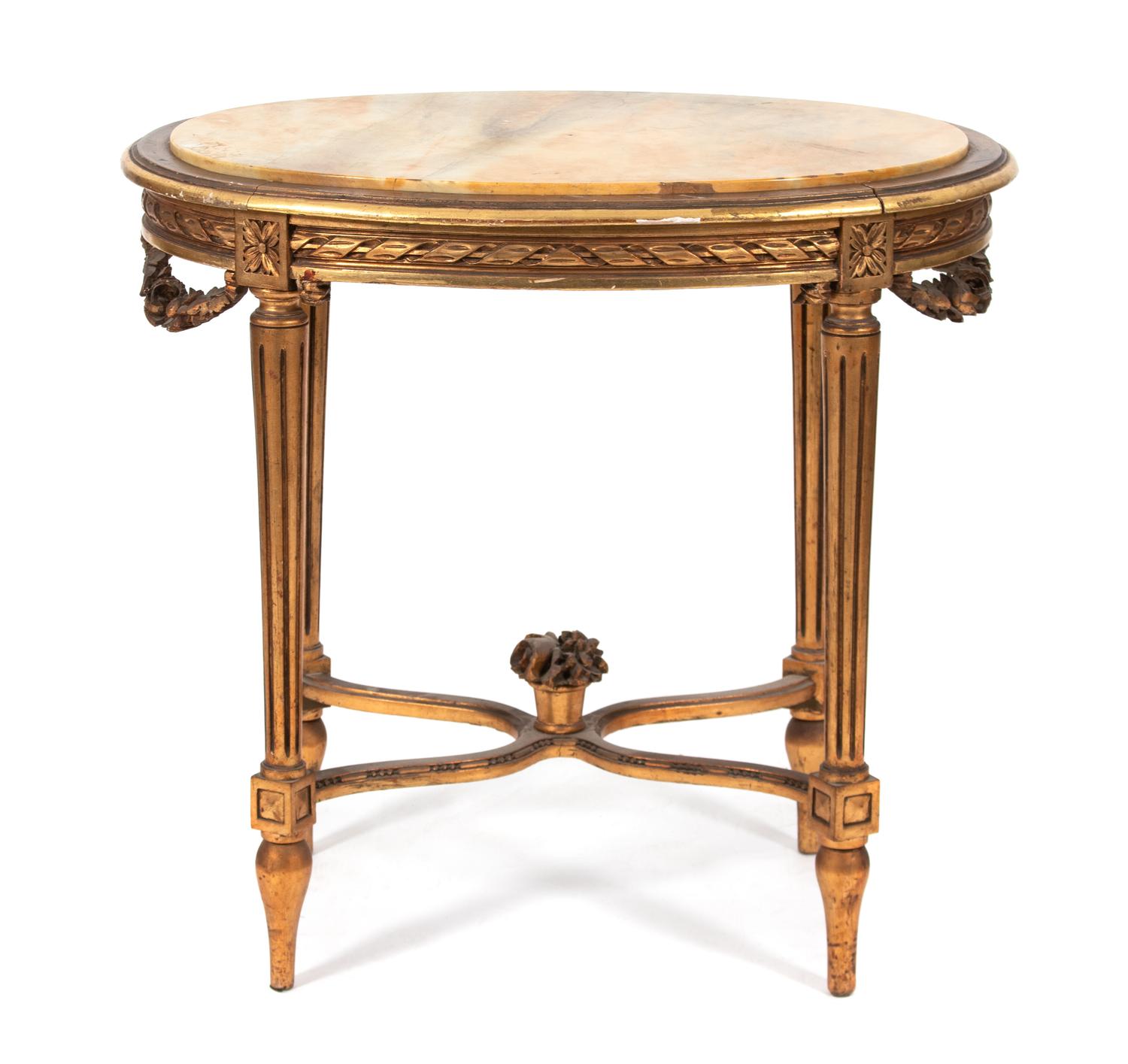 A Louis XVI Style Giltwood and Marble Top Oval Table